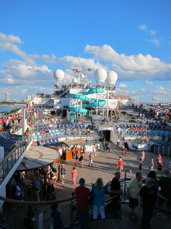 The top deck and water slides of a Carnival cruise ship