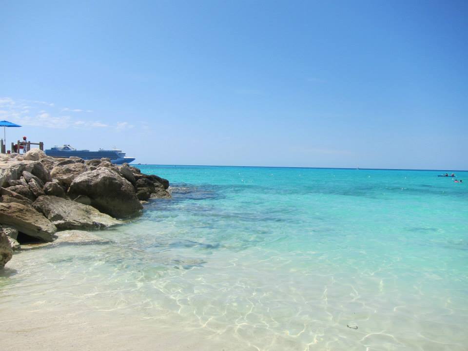 View from beach at Princess Cay with cruise ship docked in the background