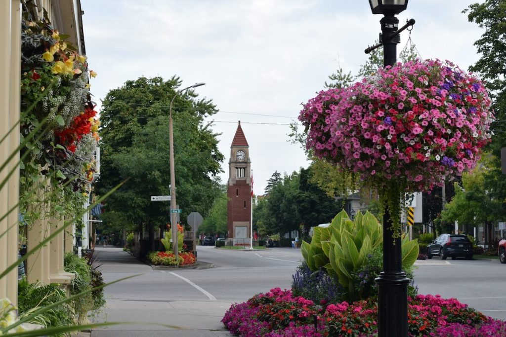 Clock tower and flowers on Queen Street in Niagara-on-the-Lake