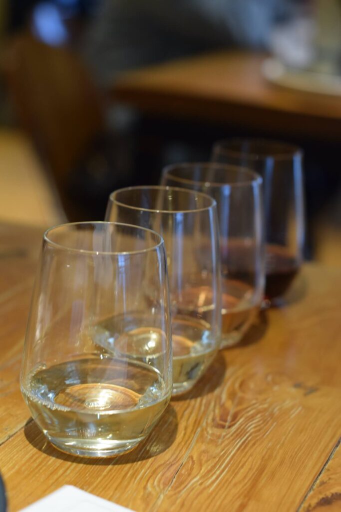 Flight of four wine tasting samples